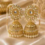 Royal Sahara Jhumkas – Oversized Gold Bell Earrings with Mirror-Work & Pearl Chains