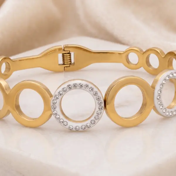 Infinity Halo Geometric Bangle – White Enamel & Crystal Hinge Bracelet