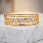 Aurora Laurel Mixed-Metal Bangle – Two-Tone Leaf Motif Hinge Bracelet