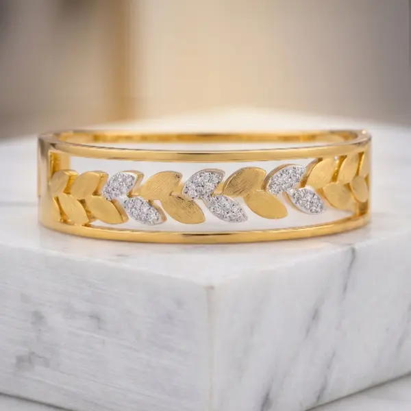 Aurora Laurel Mixed-Metal Bangle – Two-Tone Leaf Motif Hinge Bracelet