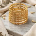Elysian Scalloped Link Bangle Set – 6-Piece Textured Gold-Finish Stack with Crystal Accents