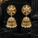 Antique gold Kundan floral jhumka earrings with pearl drops