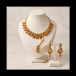 Gold amber crystal choker necklace set with chandelier earrings and maang tikka