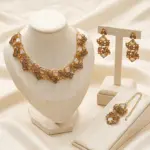 Gold champagne crystal choker necklace set with statement earrings and maang tikka