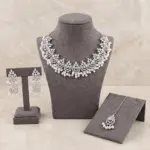 Silver zircon pearl choker necklace set with matching earrings and maang tikka