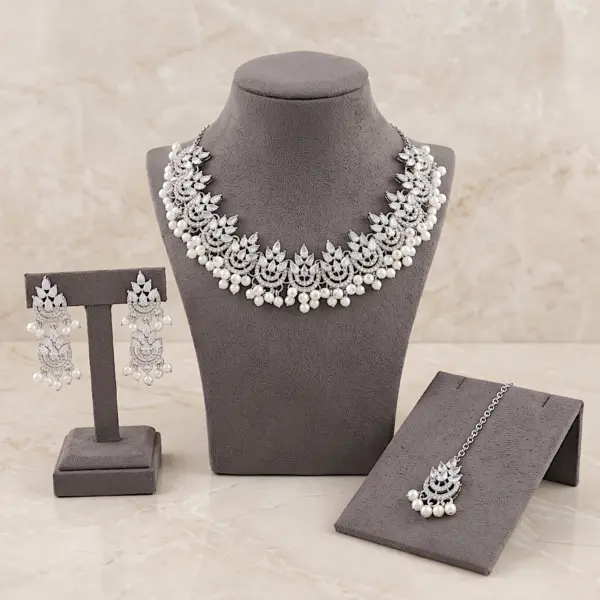 Silver zircon pearl choker necklace set with matching earrings and maang tikka