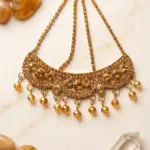 Gold crystal Jhumar passa hair jewelry with amber stones, rhinestone chains, and hanging faceted crystal beads